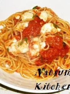 A picture of Mozzarella Cheese and Tomato Sauce Pasta.