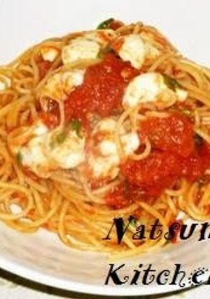 A picture of Mozzarella Cheese and Tomato Sauce Pasta.