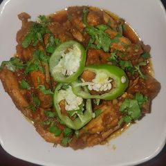 A picture of 6 basic masala chiken wings.