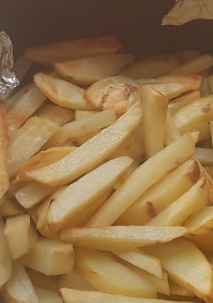 Una foto de Papas fritas en AirFryer (freidora de aire)