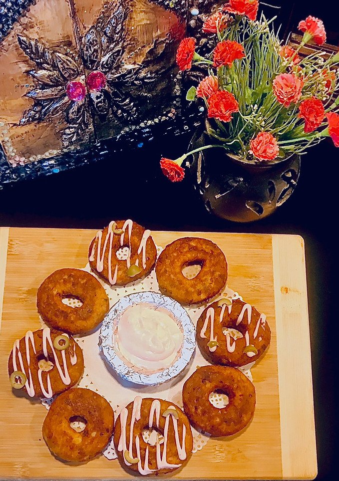 A picture of Potatoes and pasta doughnut kabab.