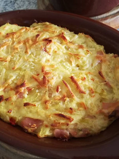 Una foto de Horneado de papas y cerdo