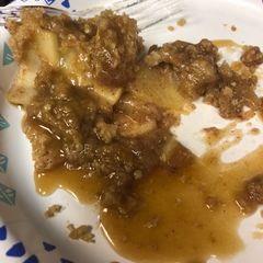 A picture of Apple Crisp with Caramel Sauce.