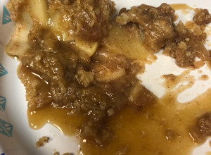 A picture of Apple Crisp with Caramel Sauce.