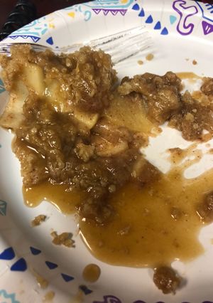 A picture of Apple Crisp with Caramel Sauce.