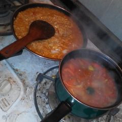 A picture of Risotto with tomato soup🍅.