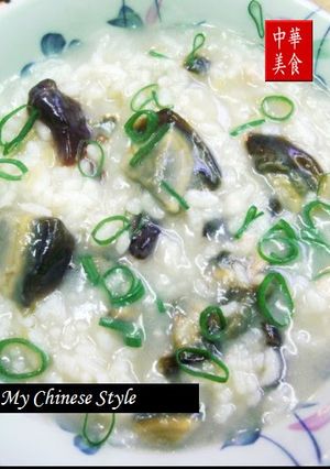 A picture of Hong Kong-Style Authentic Chinese Century Egg & Pork Rice Porridge.
