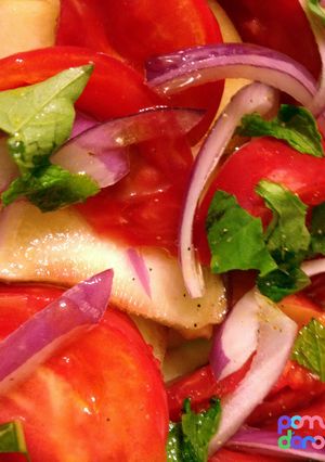 A picture of Peach and Heirloom Tomato Salad.