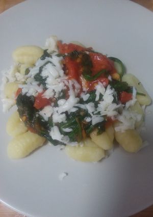 Una foto de 🥟Ñoquis a la florentina 🥬🍅