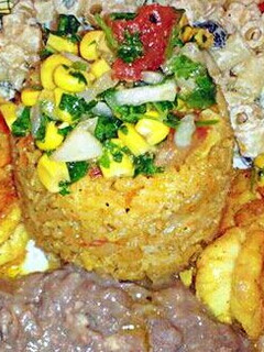 A picture of Grilled Shrimp & Rice with A Corn Pico De Gallo.