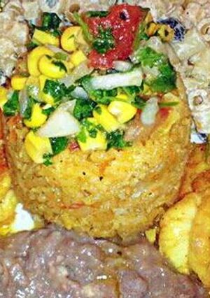 A picture of Grilled Shrimp & Rice with A Corn Pico De Gallo.