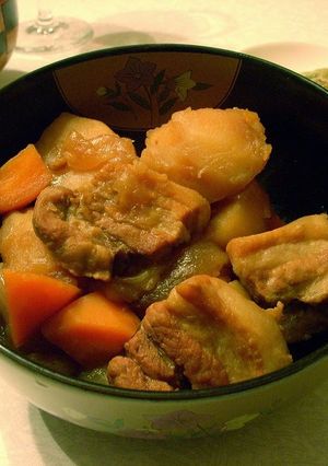 A picture of Nikujaga (Simmered meat and potatoes) with Thick Cut Pork Belly.