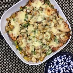 A picture of Creamy Baked Chicken with stir fried vegetables.
