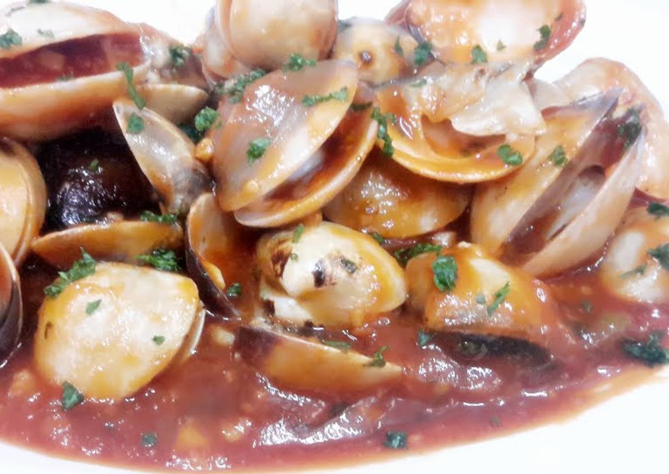Kanya's Clams in Sriracha double hot sauce :)