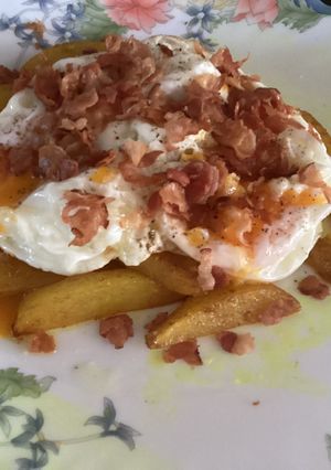 Una foto de Huevos rotos o estrellados