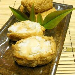 A picture of Inari sushi with a Twist - Pickled Ginger Inari.
