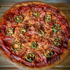 A picture of Homemade jalapeño and pepperoni bacon pizza.