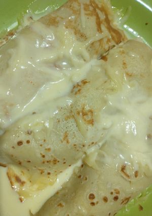 Una foto de Panqueques + relleno para canelón con sobras de pollo