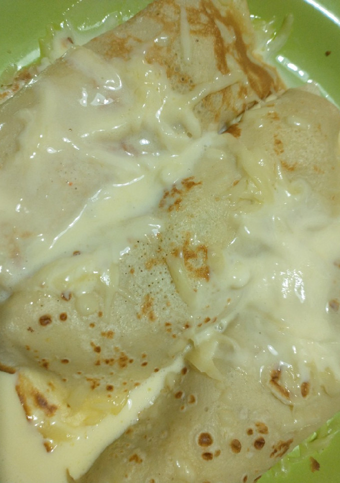 Una foto de Panqueques + relleno para canelón con sobras de pollo