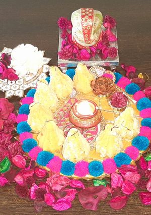 A picture of Kesariya coconut stuffed modak.