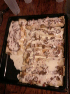 Una foto de Canelones de carne con salsa bechamel
