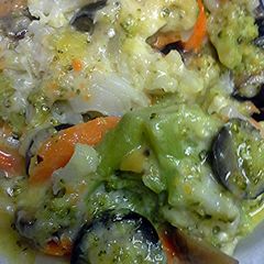 A picture of Vegetables olives and cheese.