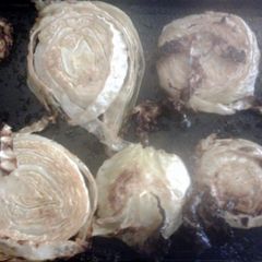 A picture of roasted garlic cabbage steaks.