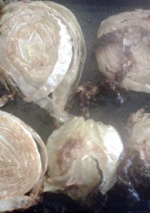 A picture of roasted garlic cabbage steaks.