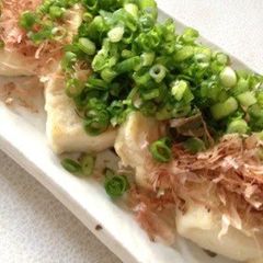 Looks like a Feast Firm Tofu with Bonito Flakes and Green Onion A picture of Looks like a Feast Firm Tofu with Bonito Flakes and Green Onion.