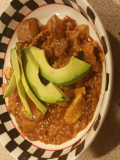A picture of Chipotle Chicken with Rice and Potatoes.