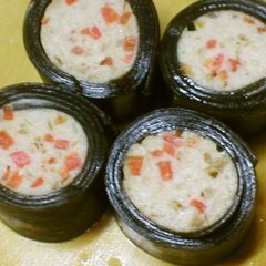 A picture of For the New Year Feast - Konbu Seaweed Wrapped Ground Chicken.