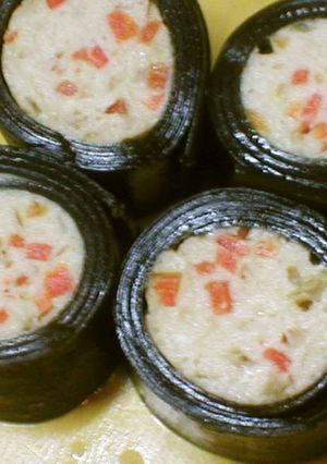 A picture of For the New Year Feast - Konbu Seaweed Wrapped Ground Chicken.
