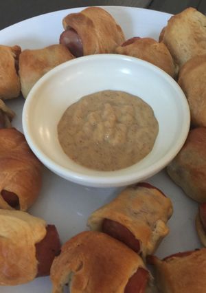 A picture of Pigs In A "Boo Boo Blanket".