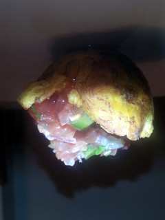 A picture of Tostones rellenos ( Stuffed fried plantain).