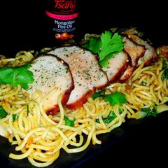 A picture of Mike's Garlic Pork & Mongolian Fire Noodles.