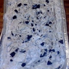 A picture of Oreo cookies n cream poke cake.