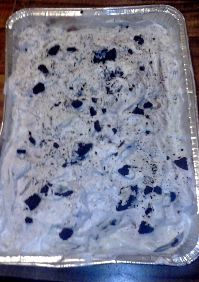 A picture of Oreo cookies n cream poke cake.
