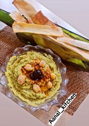A picture of Hummus with lavash.