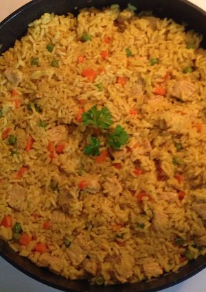 Una foto de Arroz con cerdo al curry