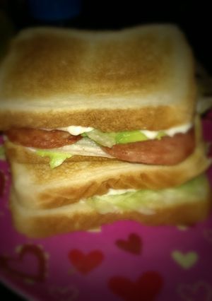 A picture of A.l.s (avocado, lettuce and spam) sandwich.