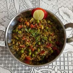 A picture of Bajra,moong and peas khichdi.