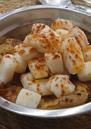 Una foto de Pota al Vapor con Patatas en Nido