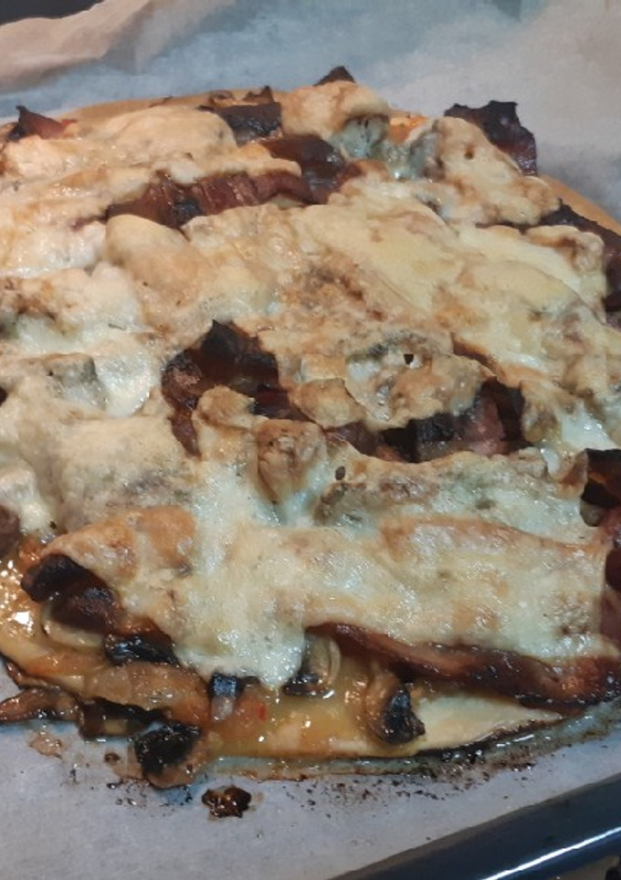 Una foto de Pizza con masa quebrada