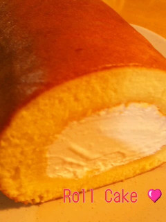 A picture of Moist Roll Cake with Milk, Butter and Cream.
