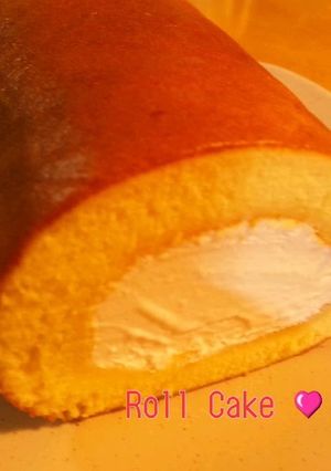 A picture of Moist Roll Cake with Milk, Butter and Cream.