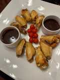 Chicken Wings with Mamba Sauce and Honey Ginger Sriracha Sauce