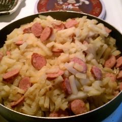 A picture of Smothered Potatoes in onions with Polish Kielbasa.