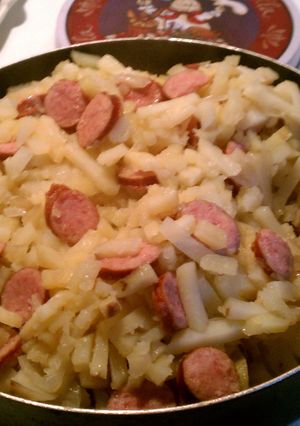 A picture of Smothered Potatoes in onions with Polish Kielbasa.