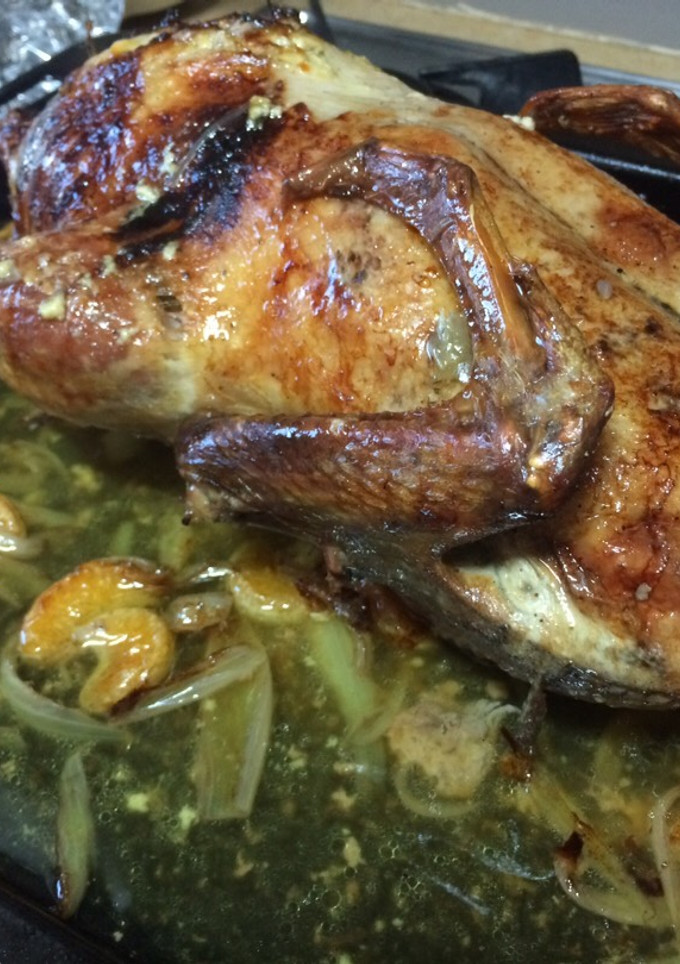 Una foto de Pato relleno asado con mandarinas