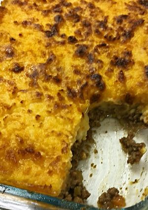 A picture of Cottage Pie with cheesy carrot potato mash.